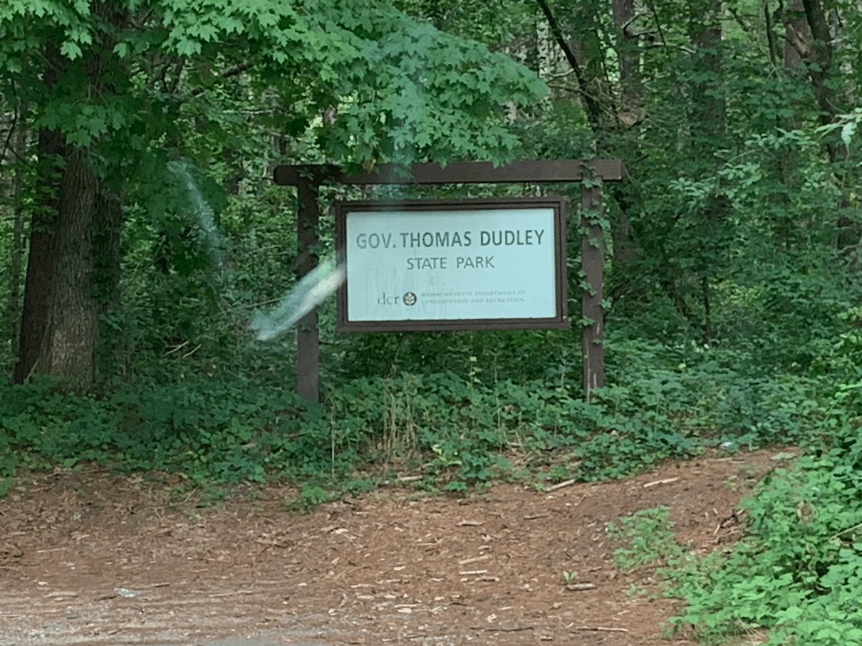 The state park marker at the head of the trail leading into the woods, where we'd find the fallen down house.